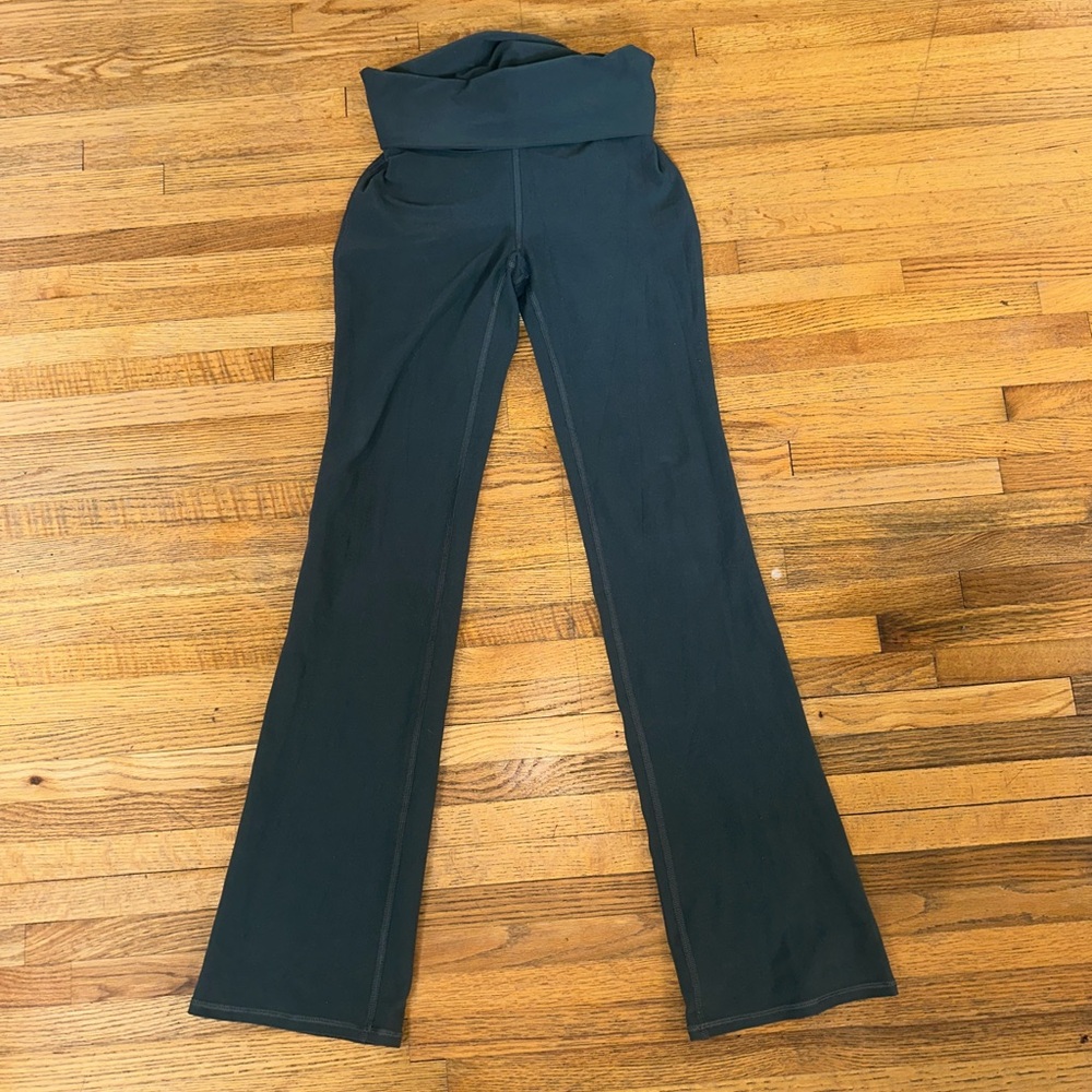 ALO Yoga Fold-Over Waist Flare Pants in Dark Green